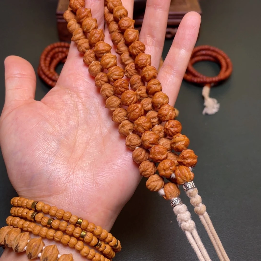 柏香籽/百香籽吊坠白牙横打手持