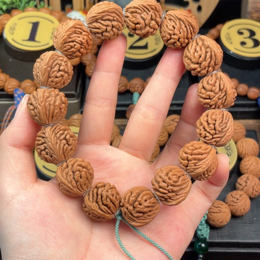 吊坠桃核刺龙纹22编织绳