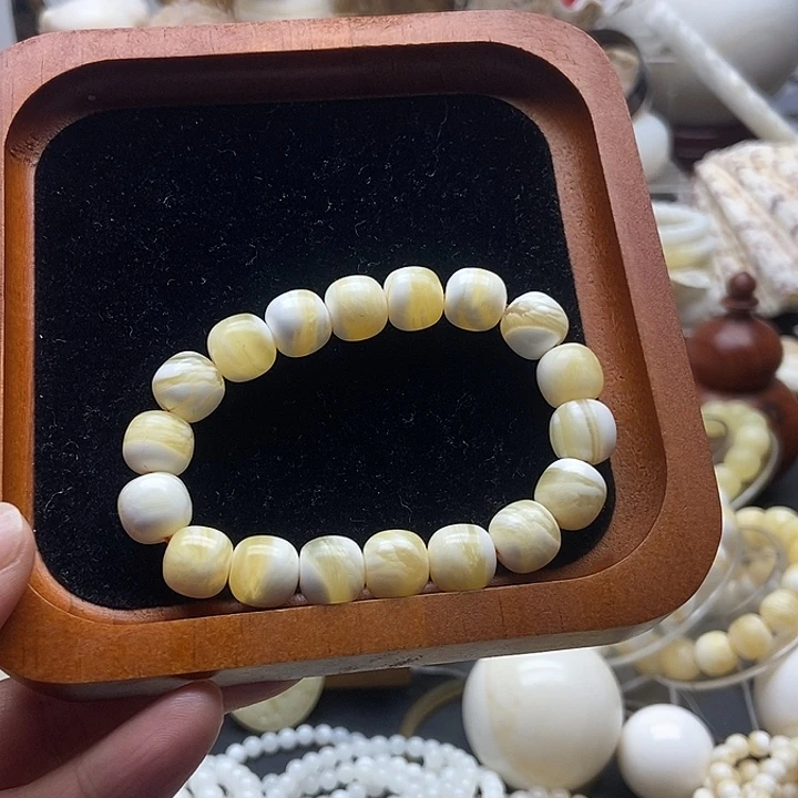 非金属贝壳蜜蜡色老型全品