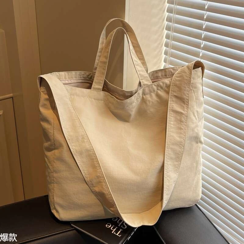 夏季大容量斜挎包包女2025新款松弛感尼龙布手提袋单肩通勤托特包