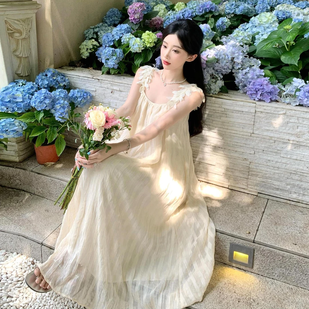 吊带连衣裙高级夏季纯欲慵懒风女装法式长裙显瘦气质海边长款法式