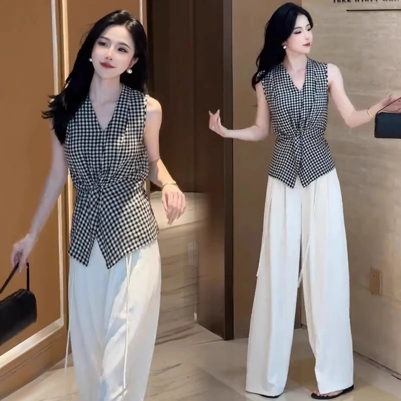 设计感扭结黑白格子背心2025夏季新款衬衫女收腰显瘦无袖上衣潮