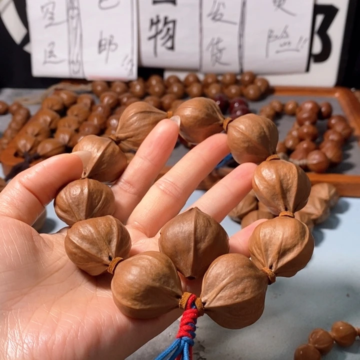 不***来橄榄核手串9272精品4花老树王蒜头铁核9+1+3通