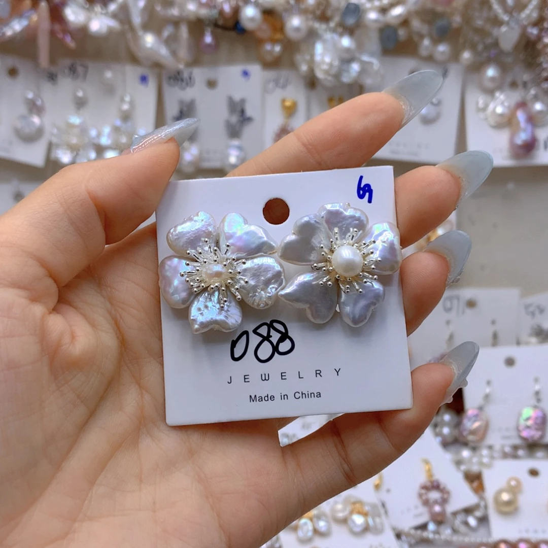 银S925镶嵌淡水珍珠耳饰可**鱼
