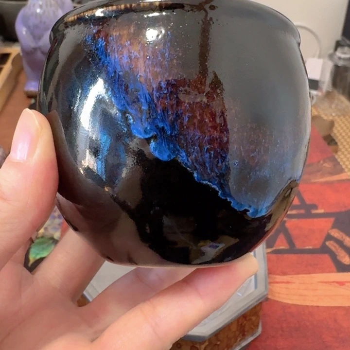 熠羽毛球的钧瓷杯