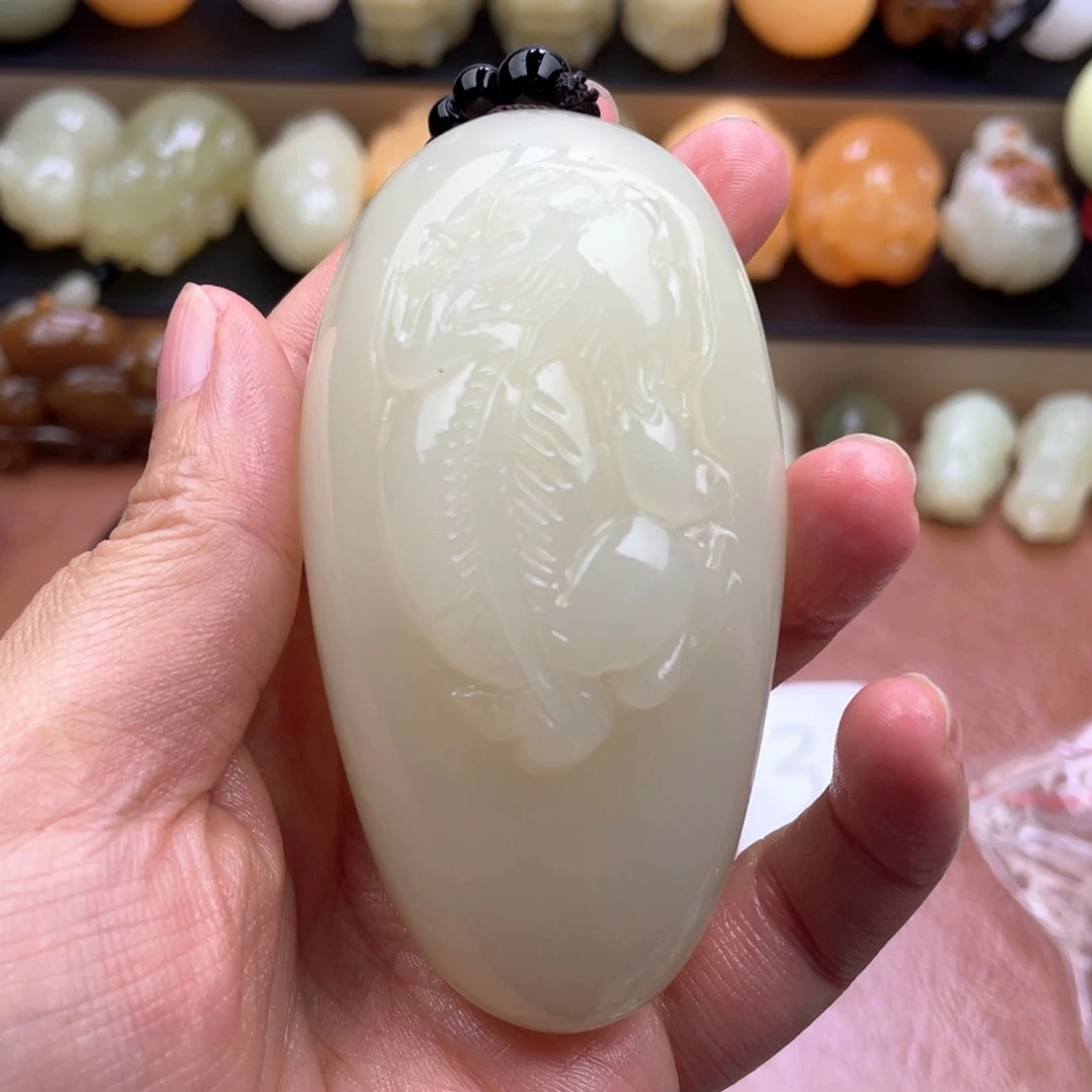 金***海石材天然古青石手把件