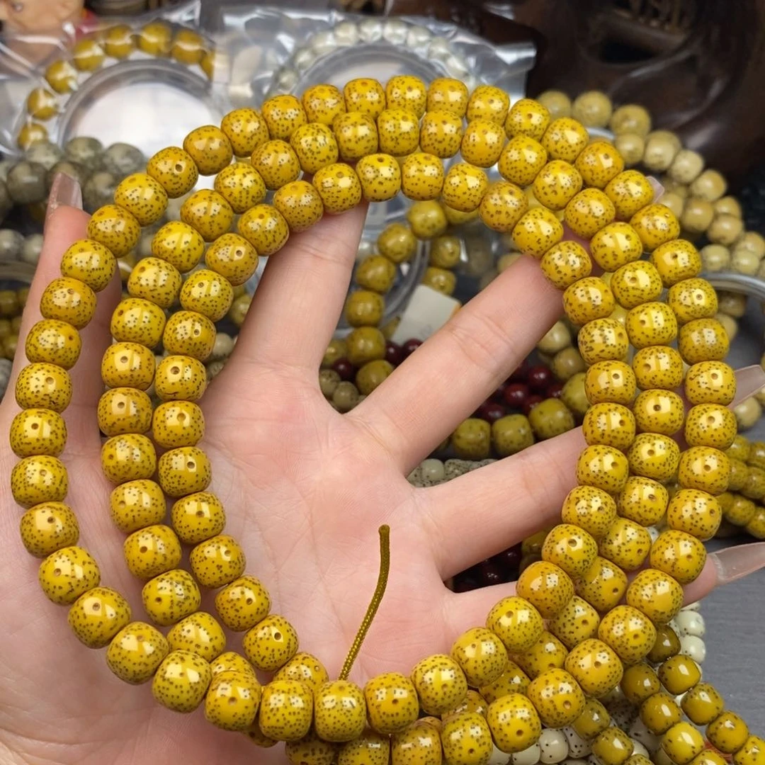 星月菩提吊坠9x10鸡油黄108