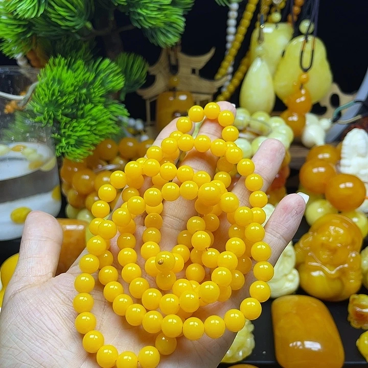 小****非金属鸡油黄念珠