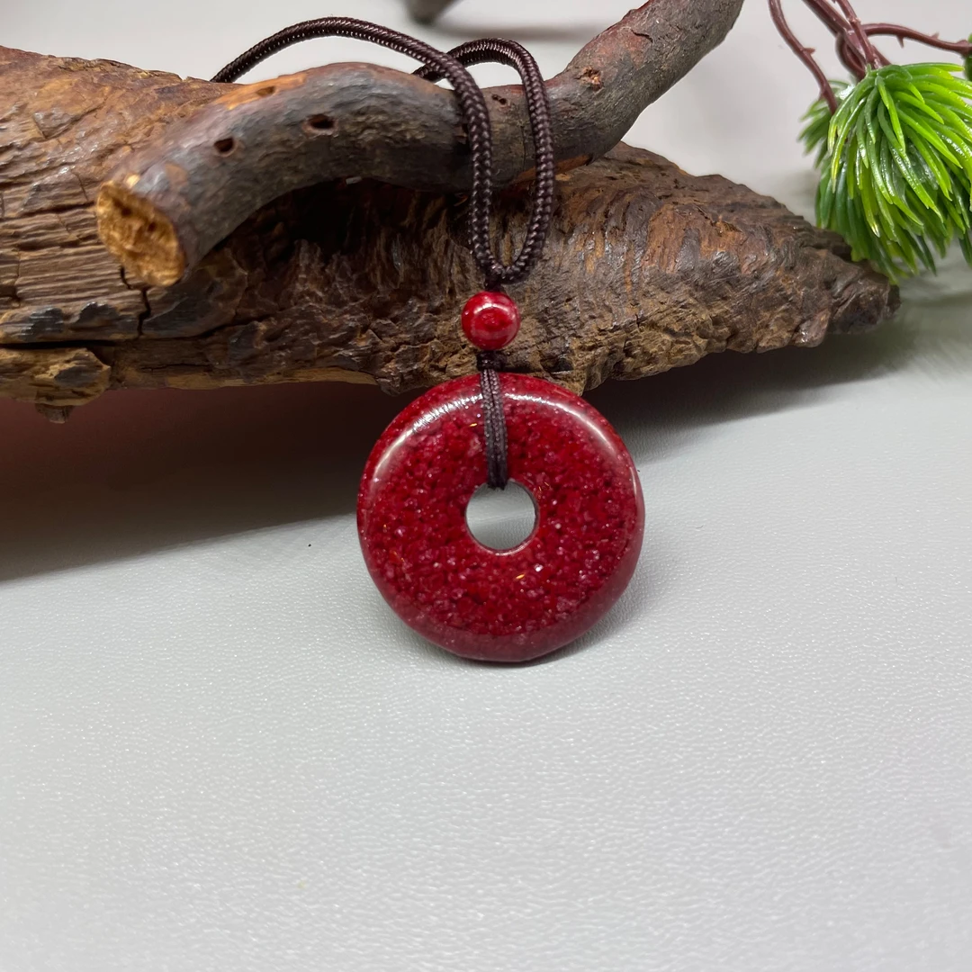 含辰砂工艺品含辰砂工艺品平安扣吊坠高透  晶体砂