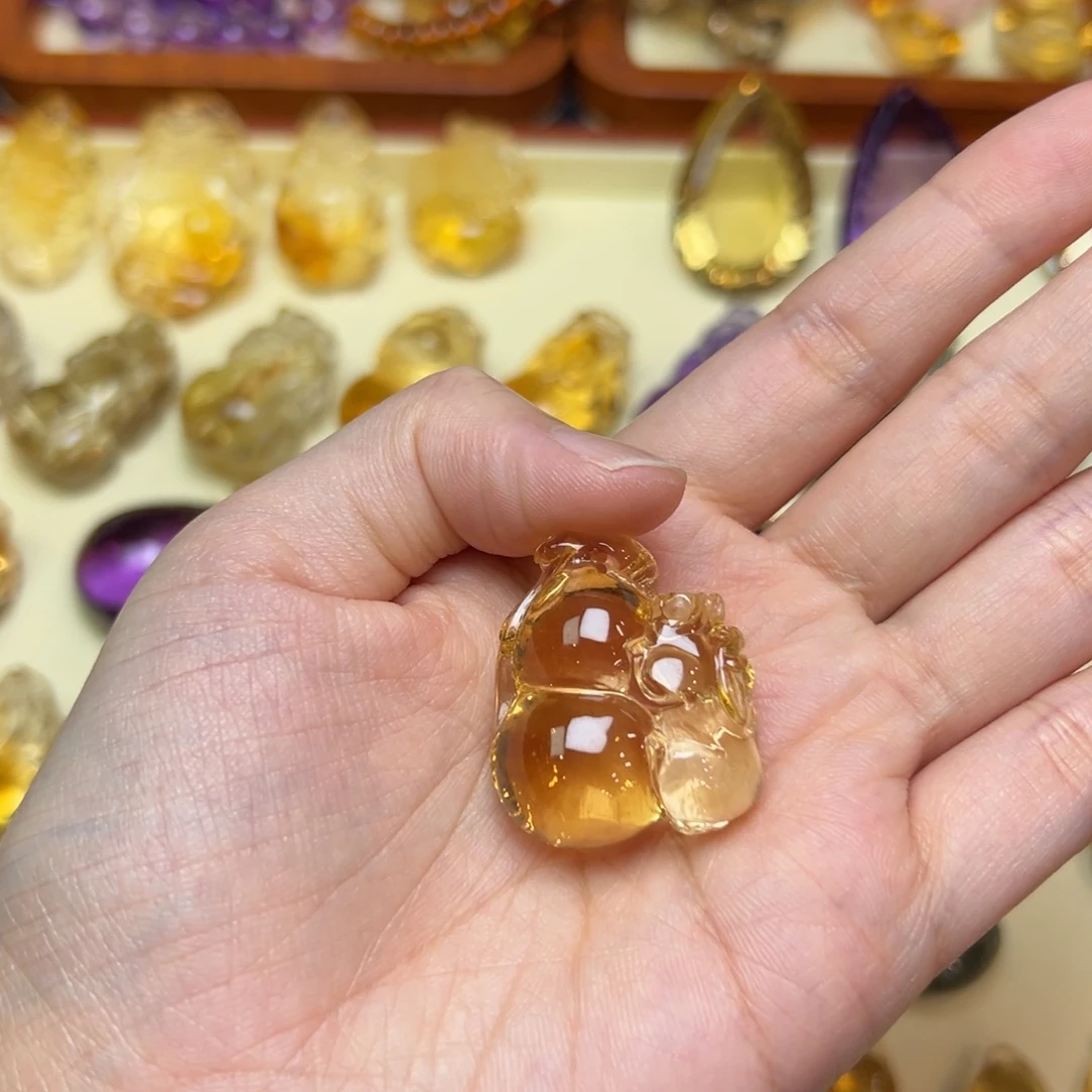 橘***带吊坠(赠链)未镶嵌水晶