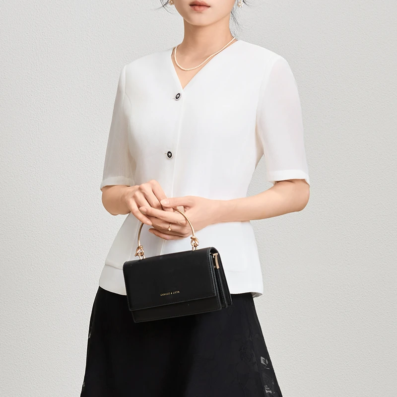 25187 夏季白短袖外套女通勤风格女上衣时尚气质黑设计感洋气小众