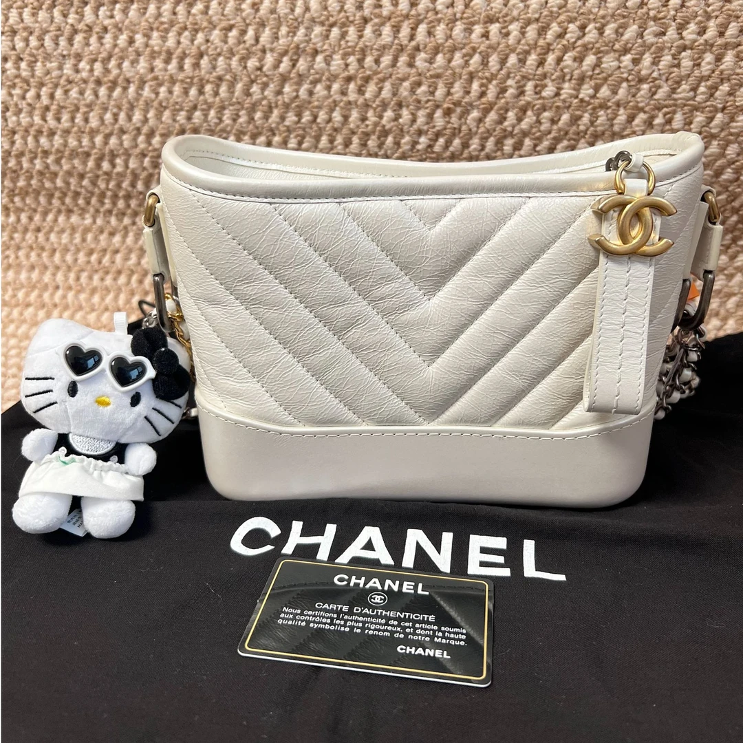 99新 Chanel/香奈儿 奶昔白V纹小号流浪/斜挎包