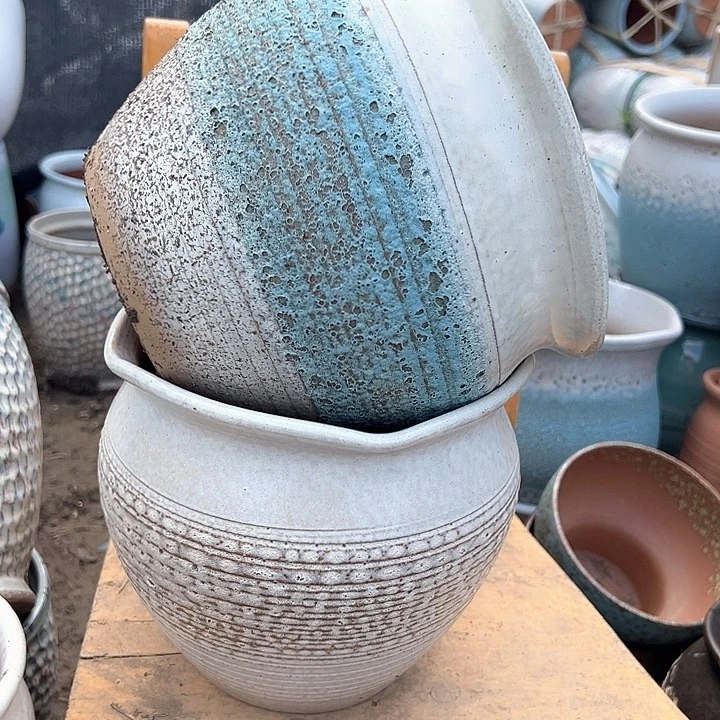 紫砂花盆口20高18。。。。。。。。。。。。。