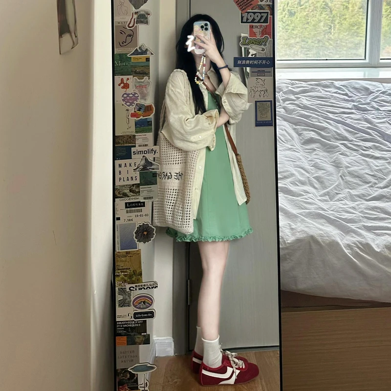 绿色花边领吊带连衣裙子女夏季2025新款今年流行爆款法式气质短裙