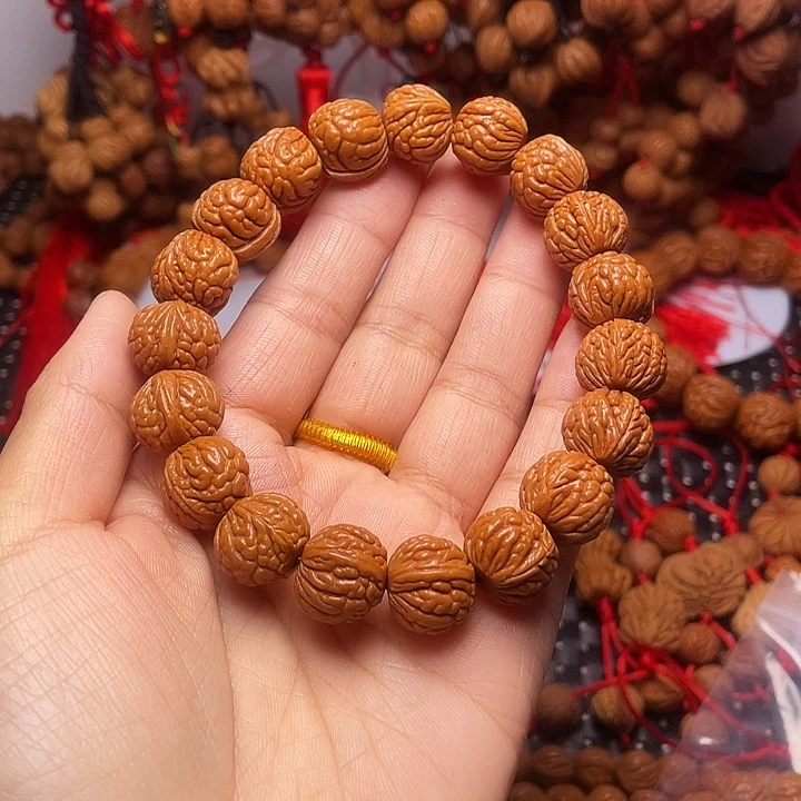 寓***贻木质类龙纹桃枭挂件