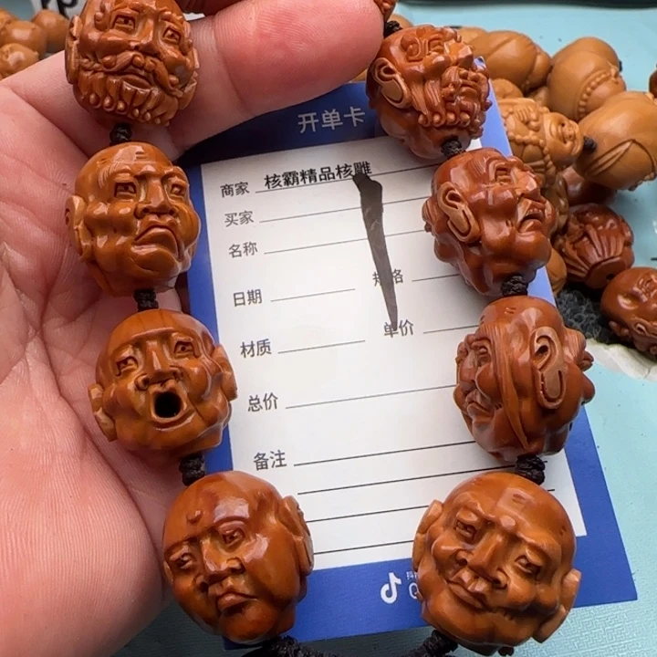 橄榄核手串阿*?橄榄核雕工艺手串