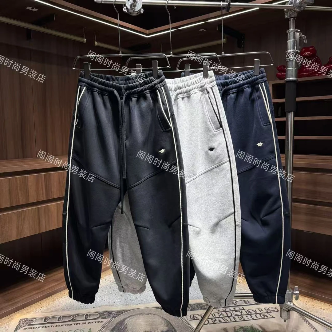 2566秋冬新款高级感痞帅立体剪裁简约束脚设计弯刀休闲裤