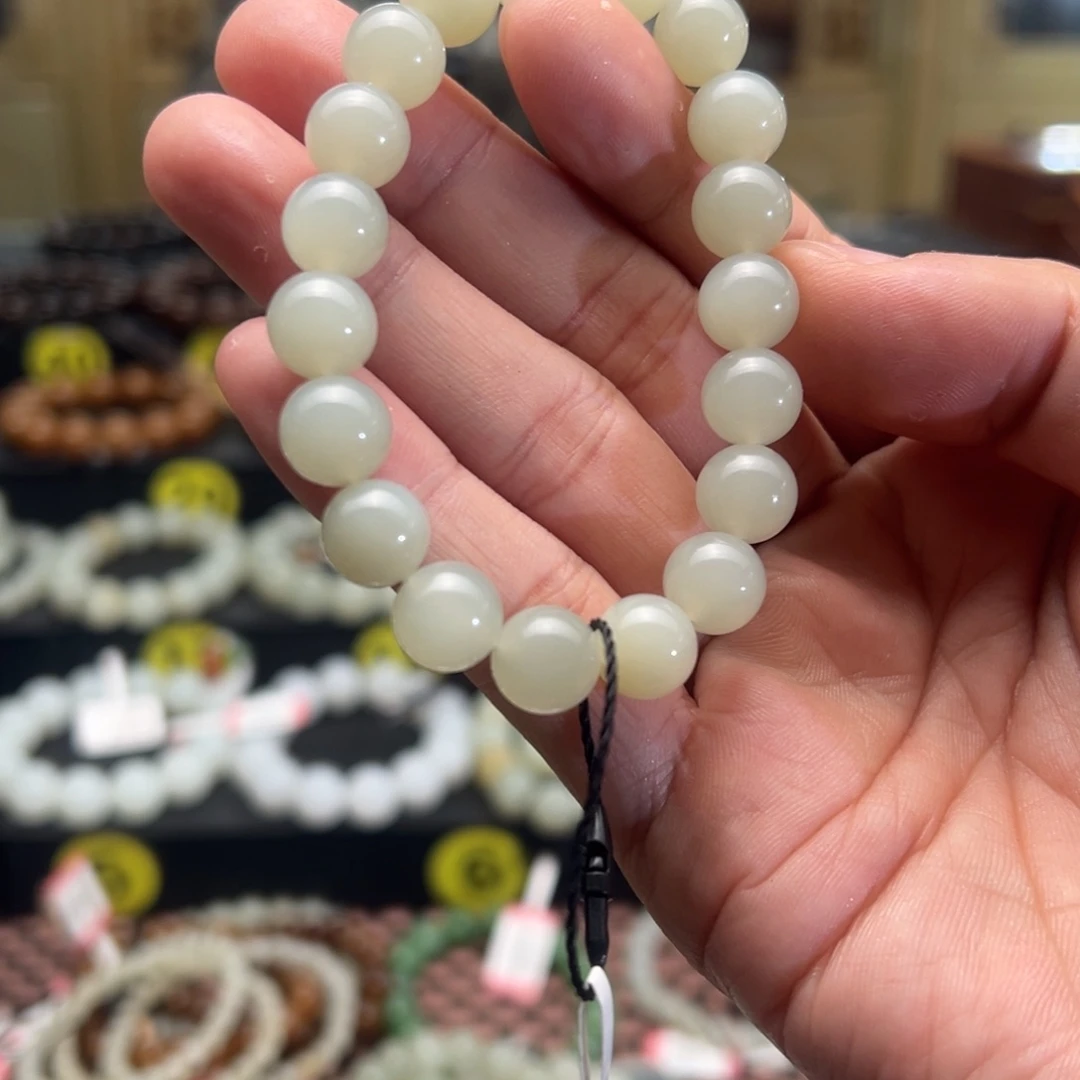 和田玉手串未镶嵌老**学卡10圆珠