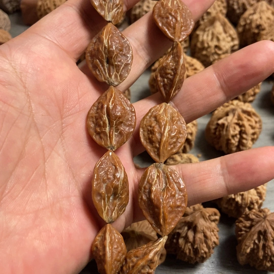 吊坠文玩核桃金叶子手持