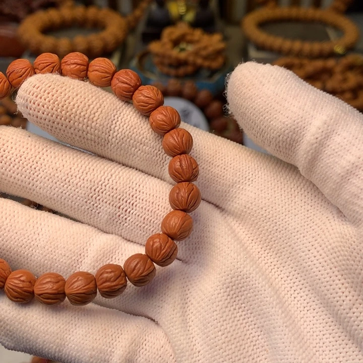 万***业桃核手串秦岭龙纹