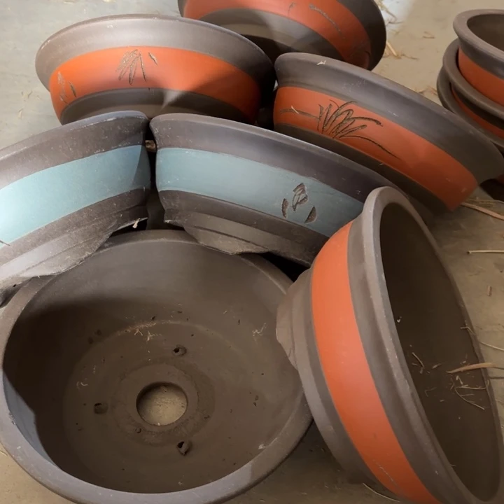 紫砂花盆100-7。