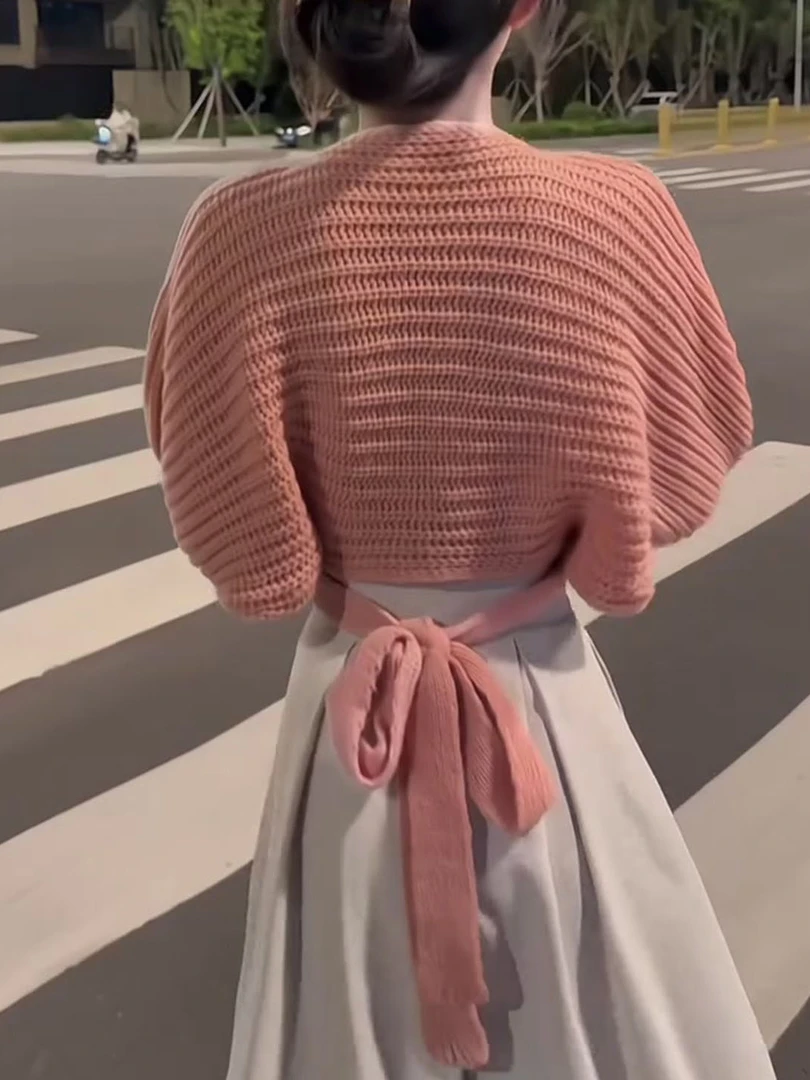 法式温柔浅粉色上衣女2025年秋季新款V领交叉绑带收腰显瘦针织衫