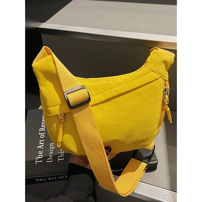 日系简约大容量斜挎包女2025夏季新款学生小挎包单肩布包饺子包女