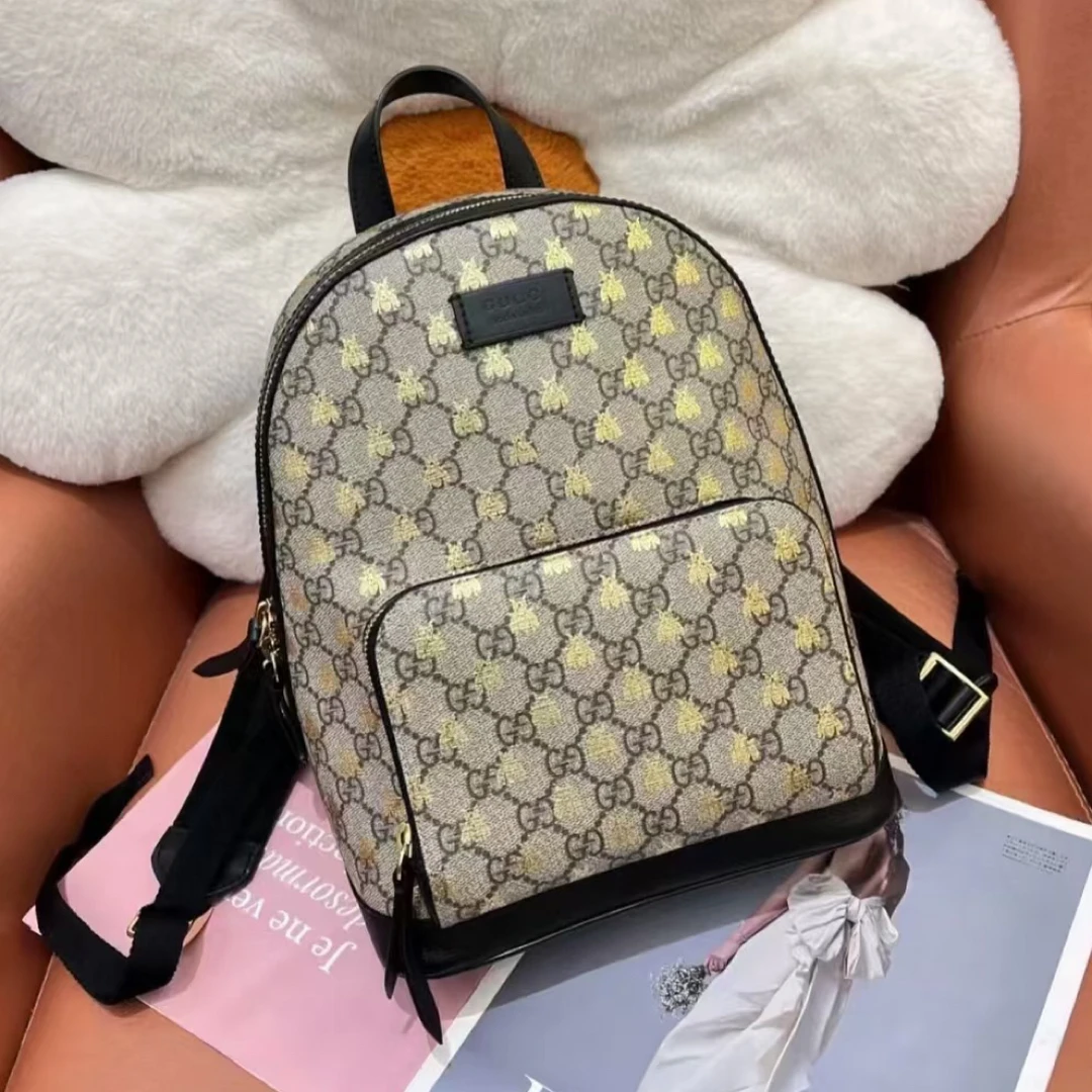 99新 GUCCI/古驰 古驰GG蜜蜂烫金老花双肩包 25090036-01