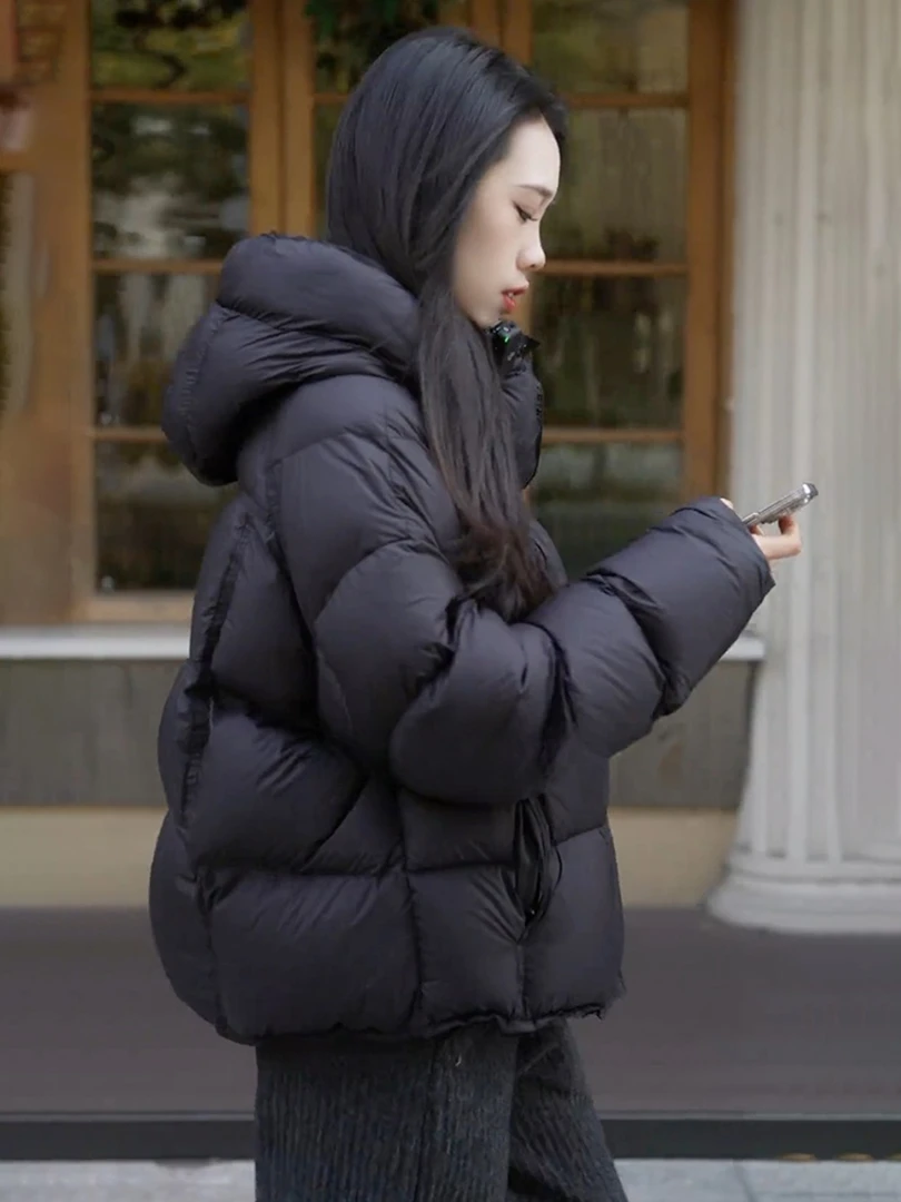 今年流行时尚黑色龟背连帽短款棉服女2025秋冬新款轻薄保暖外套潮