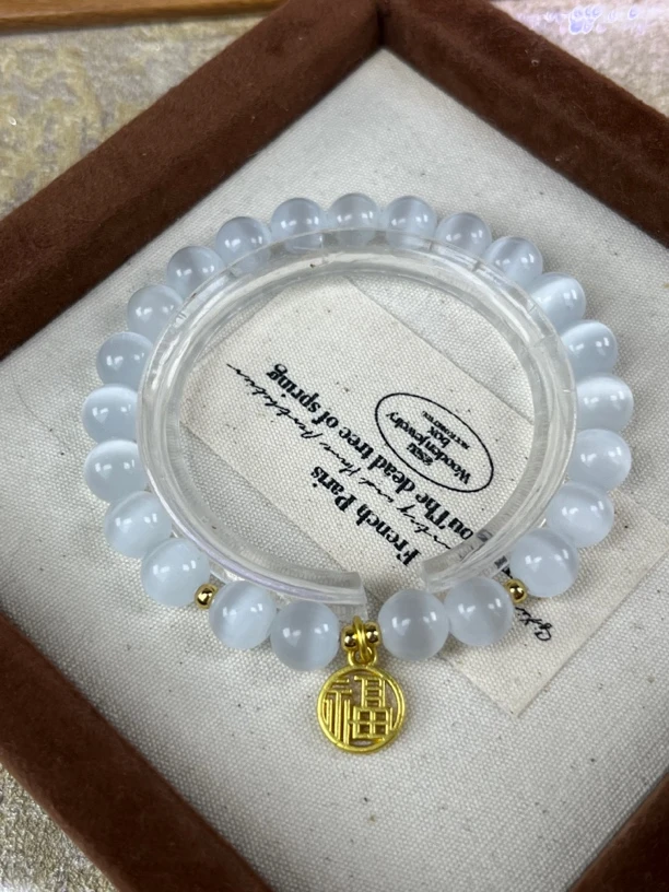 猫眼石搭配小福牌