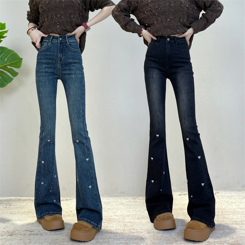 迪否蝴蝶结烫钻设计感牛仔裤冬季新款高腰修身气质微喇裤6355