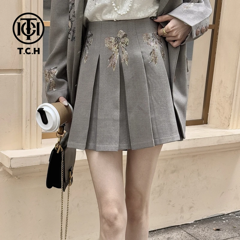 TCH现货私服烫钻工艺蝴蝶结时尚百搭半身裙女T75A22E5006轻奢tch