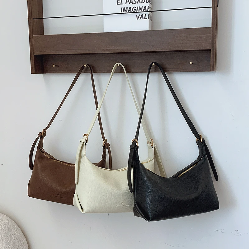 2025新年新款简约气质慵懒风大容量荔枝纹软皮单肩斜挎饺子包8088