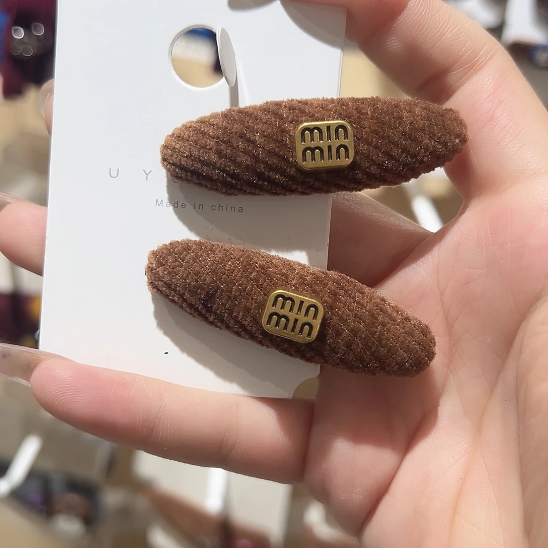 皮质铁合金咖色椭圆鸭夹