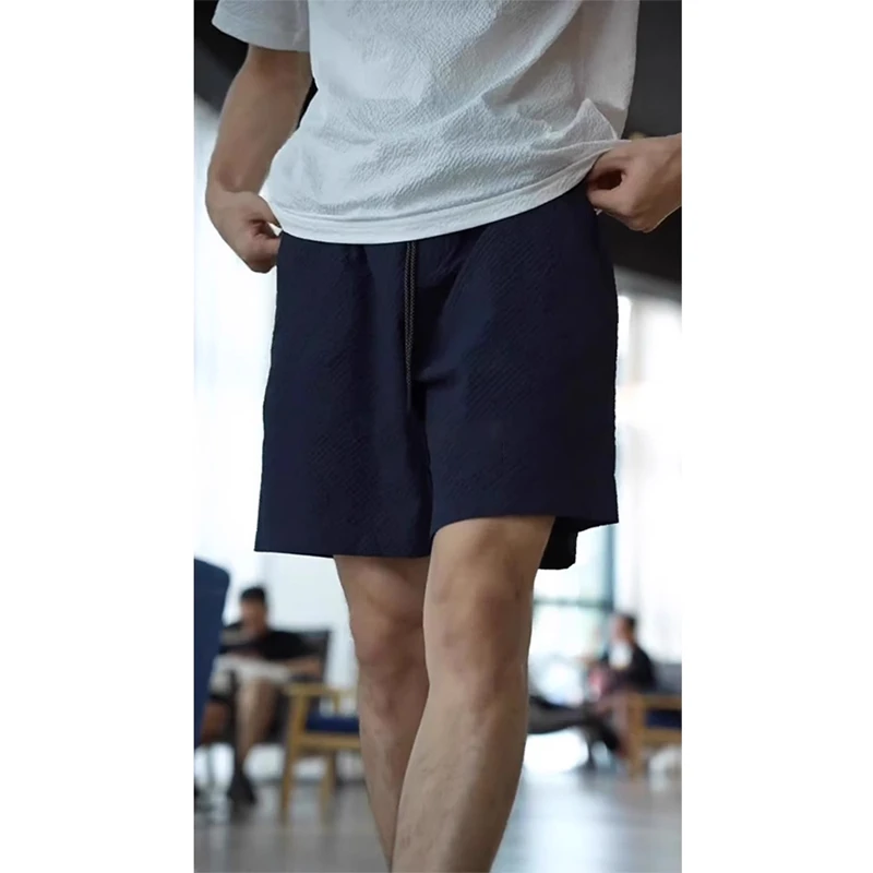 藏青色泡泡纱4分短裤男士秋季薄款美式速干运动裤不过膝五分中裤