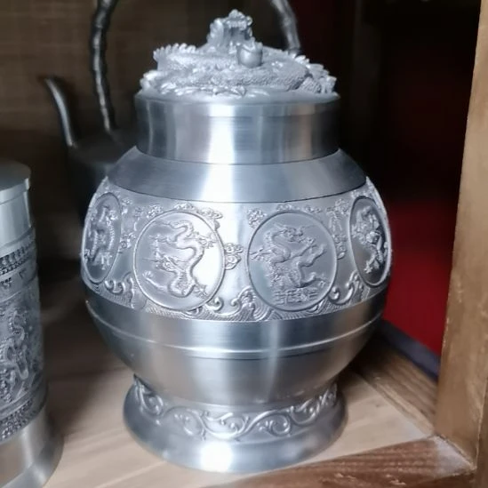 牵***奔纯锡九龙圆茶叶罐