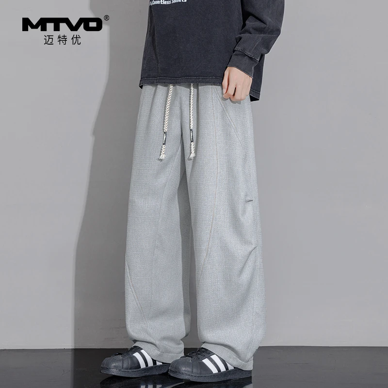宽松阔腿休闲裤2025年夏季新款男生设计感拼接褶皱松紧腰休闲长裤