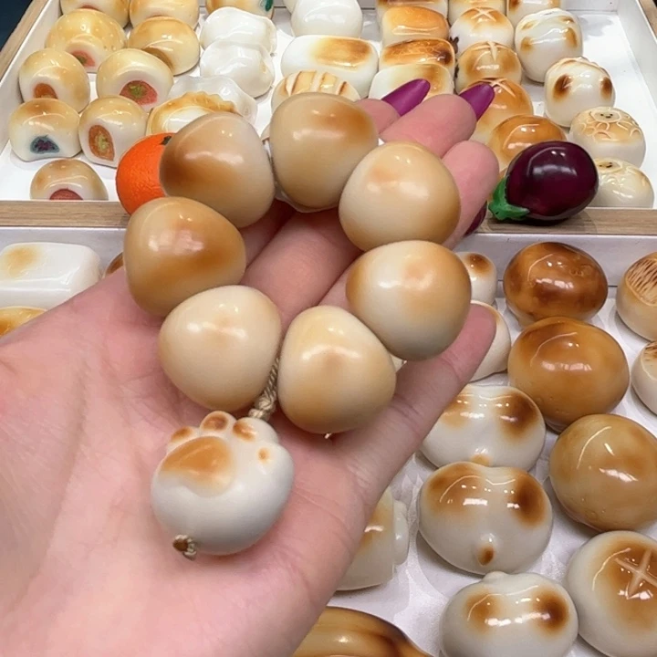 白玉菩提把件2.22.51象牙果炭烤胖胖肠