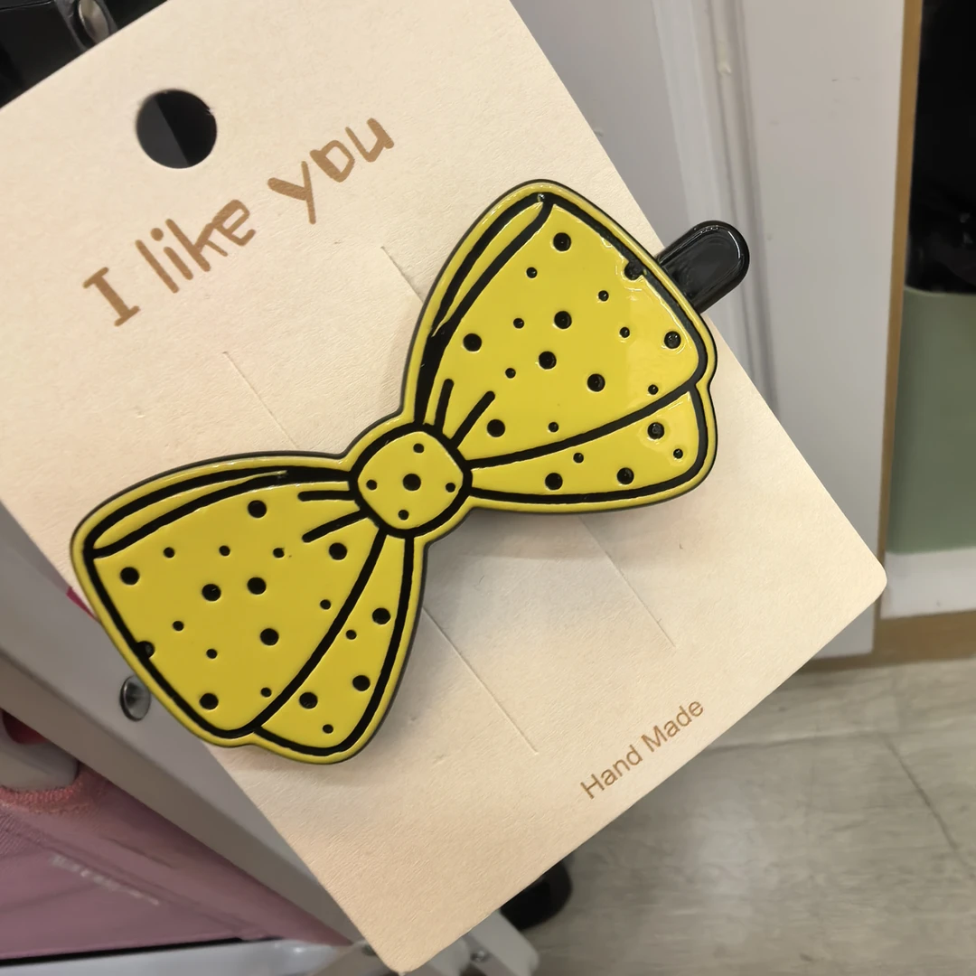 F238黄色大蝴蝶结闪闪边夹