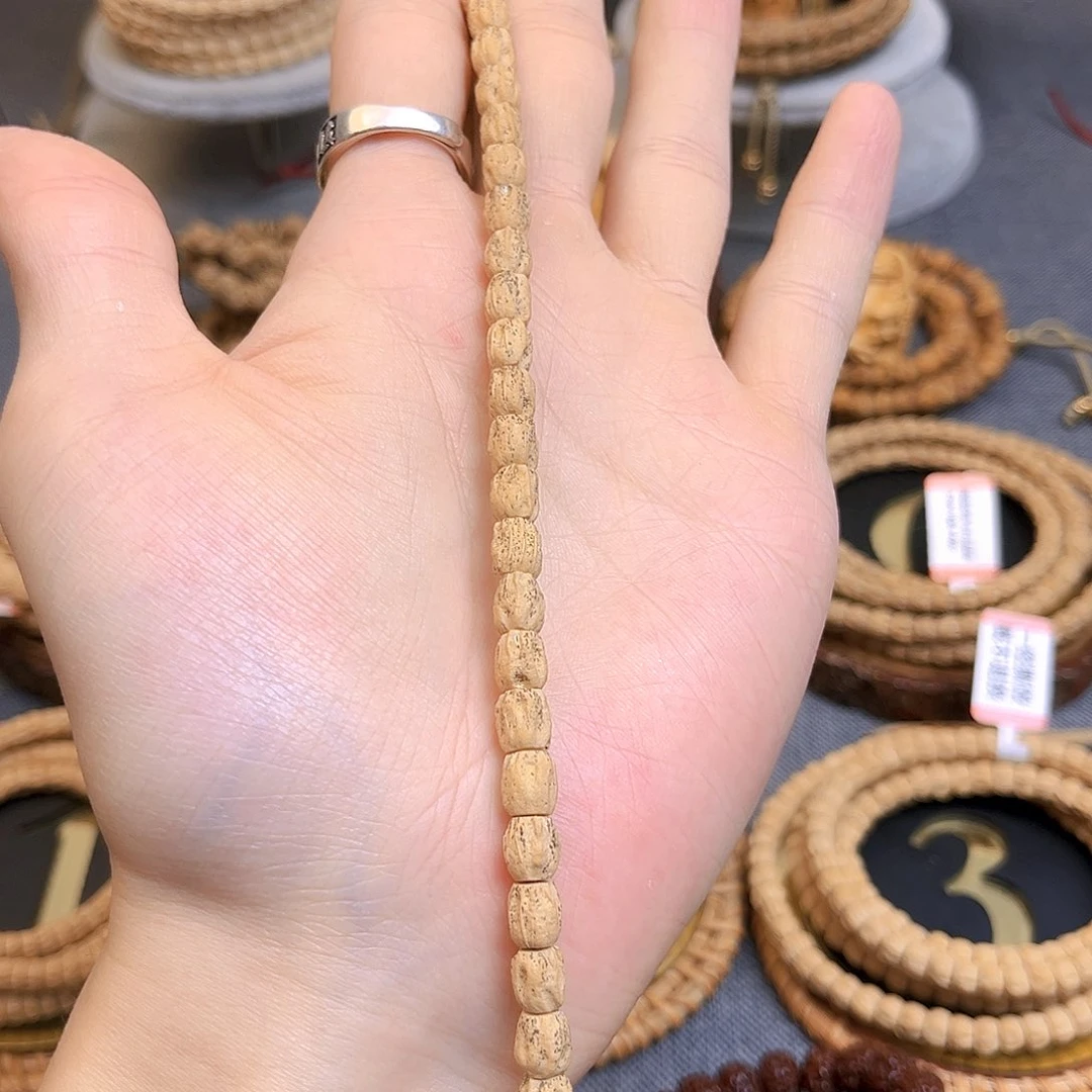 忍***冬柏香籽/百香籽吊坠