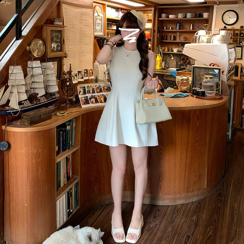 法式背心连衣裙子女夏季2025年海边度假小个子赫本风黑色短裙1971