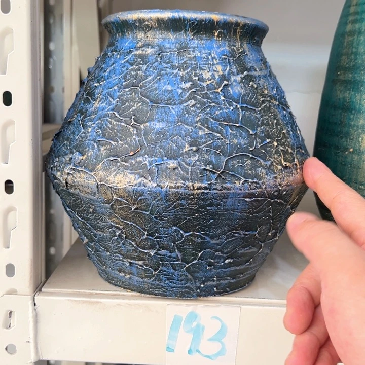 16.8-1微瑕土陶飞碟兰金