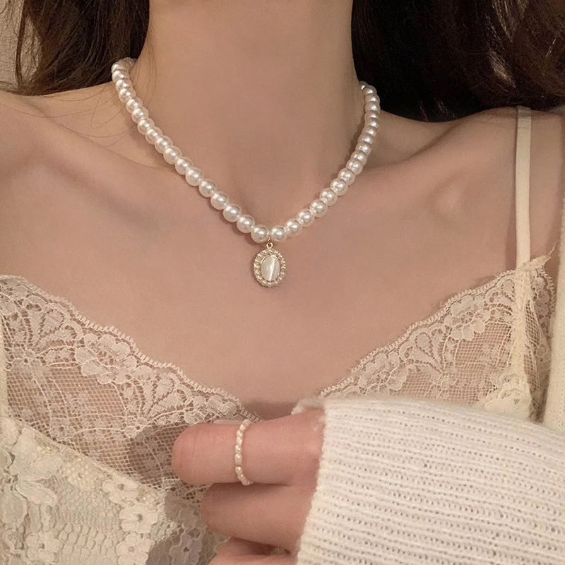 铜陶瓷项链 法式复古猫眼石珍珠项链女轻奢小众高级感锁骨链2025