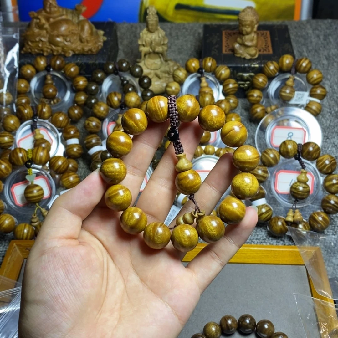 丽***后楠木（金丝楠）手串/手链枯木老料水波纹1.5