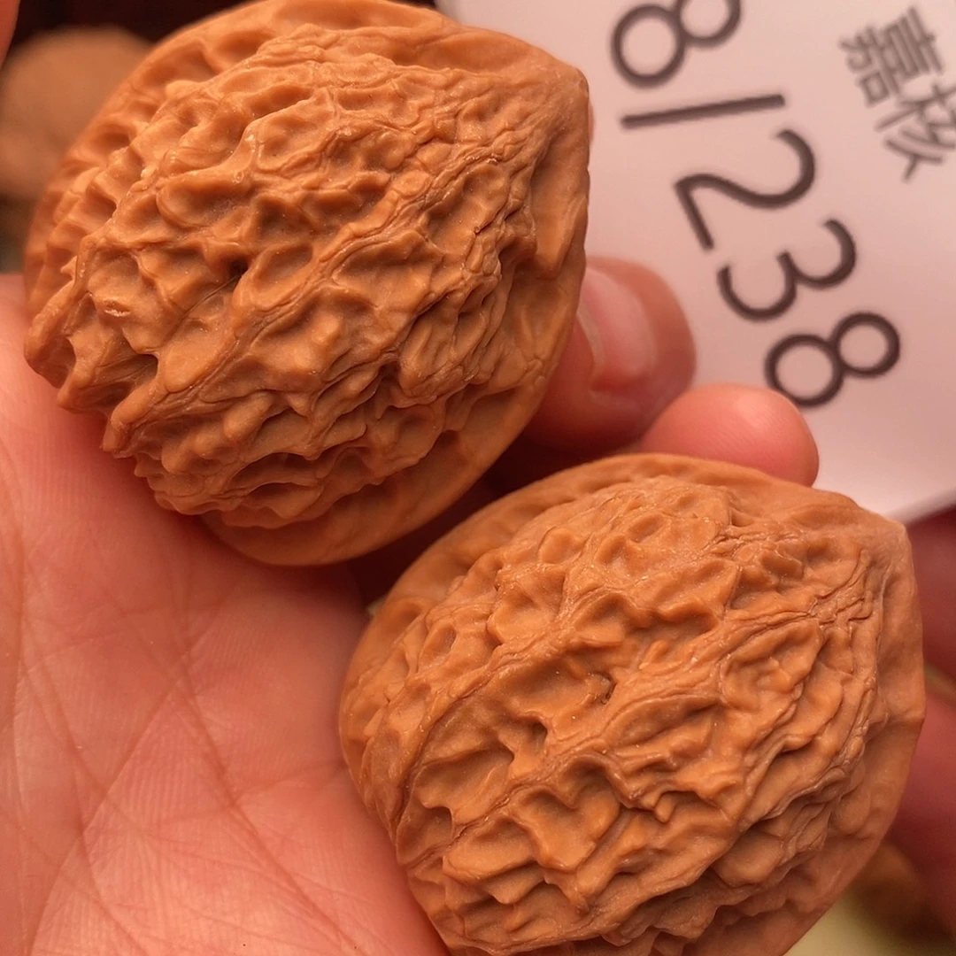 岁***歌文玩核桃把件36金牛