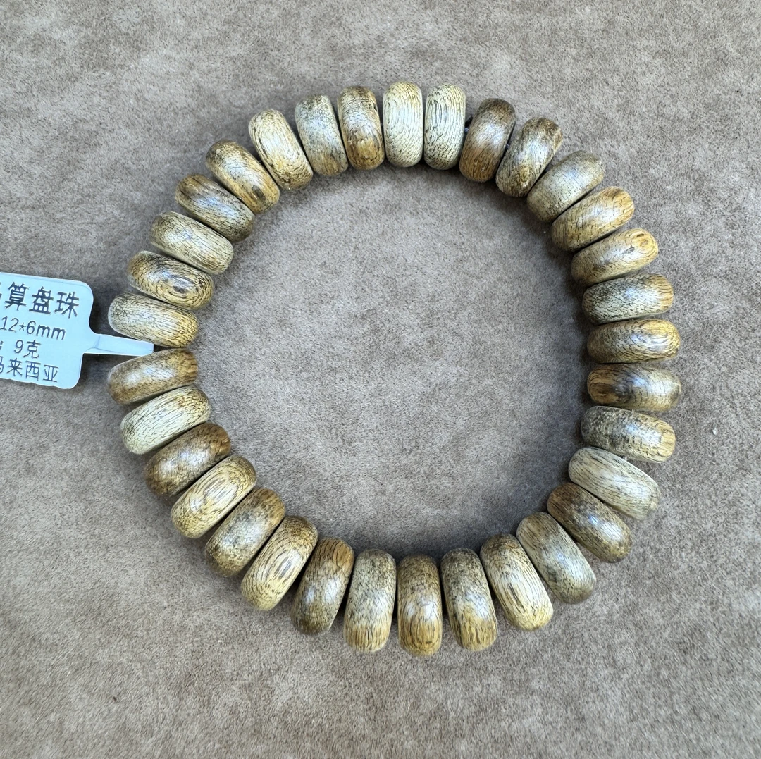 沉香西马沉香12*6算盘珠手串