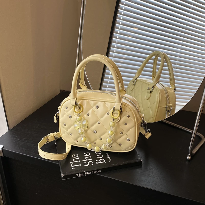 链条菱格保龄球包2025新款手提波士顿包单肩斜挎包洋气轻奢时尚