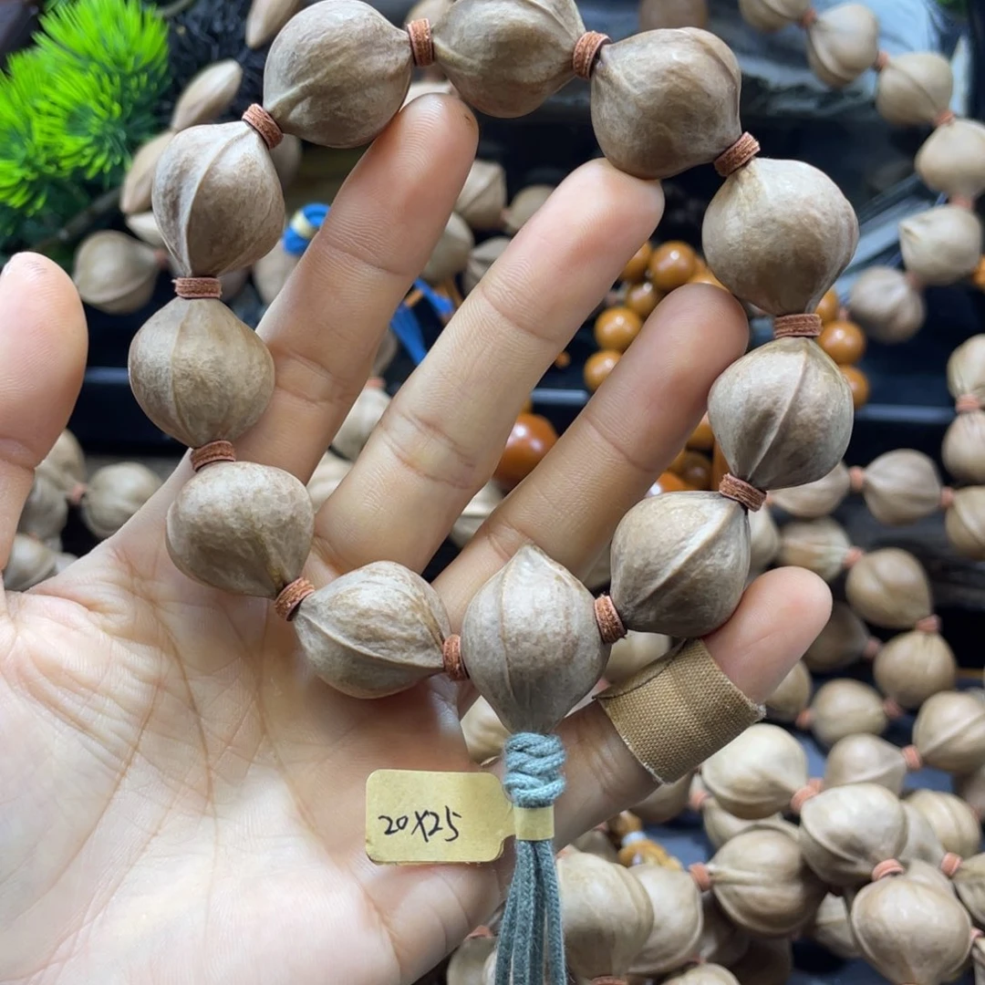 未***央橄榄核吊坠2025铁核