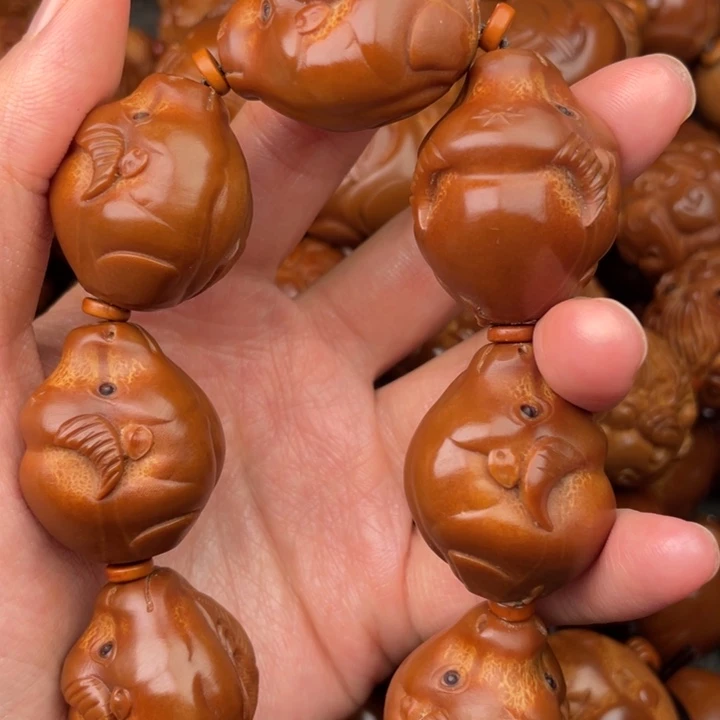 耀***子文玩核桃吊坠橄榄核