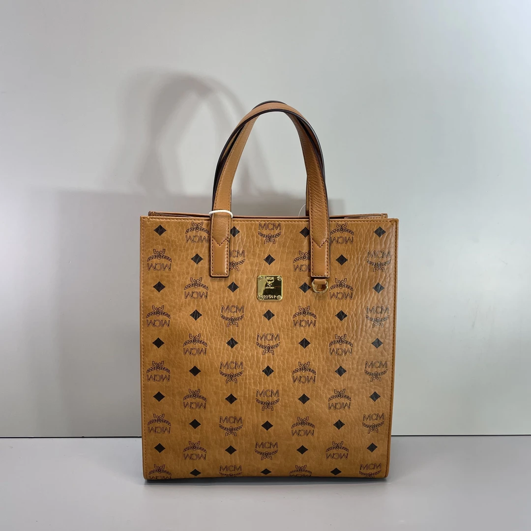 95新 MCM 媚姐/mcm干邑色大号琴谱包26*29*8cmG012408